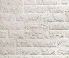 a white brick wall with no mortars on it