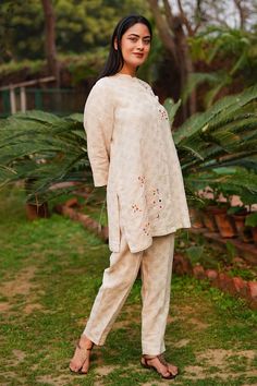 Beige linen shirt with star prints and placed multi colored thread work embroidery. - Aza Fashions Traditional Linen Tops With Chikankari Embroidery, Embroidered Linen Sets For Summer, Relaxed Fit Linen Blouse With Floral Embroidery, Beige Linen Tops With Floral Embroidery, Spring Linen Kurta With Chikankari Embroidery, Summer Cotton Kurta With Set-in Sleeves, Embroidered Linen Long Sleeve Sets, Summer Linen Kurta With Chikankari Embroidery, Summer Linen Kurta With Resham Embroidery