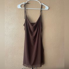 Adorable Chocolate Brown Mini Dress From Bershka. Never Worn. Size Medium Fits Size 6/8. Adorable Tie Strap Detail And Double Layered Dress With Ruffle Hem Brown Homecoming Dress, Brown Homecoming Dresses, Bershka Dresses, Brown Bodycon Dress, Blue Slip Dress, Dress With Ruffle Hem, Brown Mini Dress, Denim Overall Dress, Mock Neck Dress