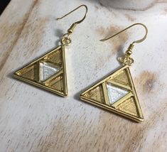 I've fabricated these unique sterling silver and 24K gold-plated Legend of Zelda inspired TriForce earrings. These are substantial and have some weight, though not so much to weigh down the earlobes. These are 1 inch in diameter and a lovely, unique keepsake for those who enjoy everything Zelda! Please feel free to convo if you have any questions and I'll answer quickly. Allow 3 days for fabrication prior to shipment. Thanks for looking! Triforce Earrings, Zelda Earrings, Zelda Jewelry, Zelda Totk, Legend Of Zelda Memes, Felt Bag, Fancy Outfits, Moon Pendant, Dream Jewelry