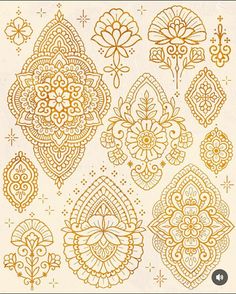 an intricate golden pattern on white paper