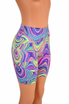 "This item is made to order, please read all the way through the listing before purchasing! Our bike shorts have a high waist, a wide, flattering, stretchy, elastic free waistband, and an 8\" inseam. Made in our black light reactive glow worm print! Womens Sizing (See below for instructions on where measurements should be taken) XXS: Bust 29\"-30\" / Waist 22\"-23\" / Hips 30\"-32\" Extra Small: Bust 31\"-32\" / Waist 24\"-25\" / Hips 33\"-35\" Small: Bust 33\"-34\" / Waist 26\"-28\" / Hips 36\" Multicolor Activewear With Built-in Shorts, Multicolor Gym Shorts, Spring Multicolor Yoga Shorts, Trendy High Waist Shorts For Yoga, Multicolor Athletic Shorts With Built-in Shorts, Multicolor Stretch Gym Shorts, Multicolor Stretch Shorts With Built-in Shorts, Trendy Multicolor Sports Shorts, Multicolor Short Activewear For Spring