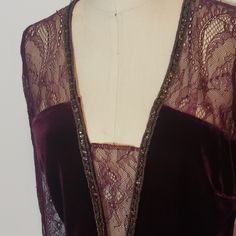 This Elegant Dress Is A Beautiful Burgundy/Merlot Color And Made Out Of Stretch Velvet. The Top Part Of The Back And Sleeves Are Lace. The Back Has Beautiful Crystal Buttons With Easy Stretch Elastic Closure. The Neckline And Waist Are Ornamented With Beautiful Rhinestones. Pit To Pit Is About 16.5in (Darts On The Bustline) Waist Is About 14in Hips About 17 In Length From Top Of Shoulder To Hem Is About 40in This Is A Stretch Velvet With Rhinestone And Chain Sewn On. Never Worn. It Is The Wrong Burgundy Lace Evening Dress, Burgundy Sheath Dress For Formal Occasions, Elegant Embellished Burgundy Dresses, Elegant Burgundy Evening Dress For Holiday, Elegant Burgundy Holiday Evening Dress, Elegant Burgundy Cocktail Evening Dress, Burgundy Silk Dress For Party, Burgundy Silk Party Dress, Festive Burgundy Dress For Formal Occasions