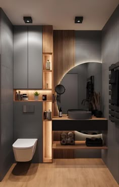 a modern bathroom with wood paneling and grey walls