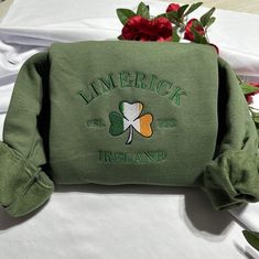 Stay warm and look stylish with this unique Limerick Ireland embroidered  at the center of the chest This piece of clothing is perfect for any casual occasion. The high-quality fabric keeps you warm and comfortable, while the intricate embroidery brings a touch of elegance and charm to any ensemble. Whether you're out and about or just lounging at home, this sweatshirt is sure to make you stand out from the crowd. The sweatshirt also features a classic crew neckline and long sleeves for a timele Winter Crew Neck Sweatshirt With Embroidered Patch, Winter Embroidered Patch Crew Neck Sweatshirt, Fall Gift Sweatshirt With Embroidered Logo, Casual Sweatshirt With Embroidered Logo As Gift, Casual Sweatshirt With Embroidered Graphics As Gift, Casual Embroidered Sweatshirt For Gift, Casual Embroidered Sweatshirt As Gift, Casual Sweatshirt With Letter Embroidery As Gift, Casual Sweatshirt With Embroidered Text As Gift