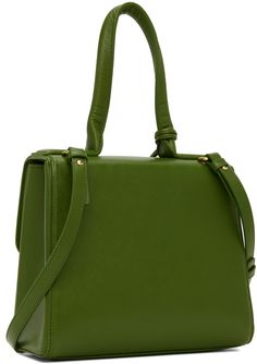 Grained calfskin top handle bag in green. · Detachable graphic hardware at rolled carry handle · Adjustable and detachable shoulder strap · Bumper studs at base · Foldover flap with flip-clasp closure · Patch pocket at interior · Grained lambskin lining · Brass-tone hardware · H8 x W9 x D4 in Supplier color: Avocado/Brass Green Top Handle Satchel With Adjustable Strap, Green Top Handle Shoulder Bag With Adjustable Strap, Luxury Green Satchel With Handles, Luxury Green Satchel With Double Handle, Green Leather Shoulder Bag With Adjustable Handle, Green Top Handle Shoulder Bag, Green Top Handle Satchel For Shopping, Green Shoulder Bag With Detachable Strap And Double Handle, Green Satchel With Adjustable Double Handle