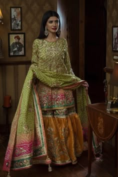 Pakistani Bridal Mehndi Gharara in Green Color with Magnificent Look emblazoned with beautiful embroidery. Buy Latest Bridal Mehndi Gharara online in USA. Mehndi Gharara, Pakistani Bridal Mehndi, Garara Sharara, Pakistani Mehndi Dress, Gharara Designs, Brown Clothes, Bridal Mehndi Dresses, Pakistani Mehndi, Mehndi Outfit