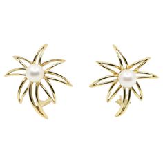 Tiffany & Co. 18K Gold & Pearl Firework Earrings Stamped: TIFFANY&CO. 750 FIREWORK 18K Approximate Dimensions: 3 cm (Length) 2.8 cm (Width) 7.20 - 7.32 mm(Pearl) 13.4 grams in weight.