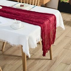 a table with a white and red cloth on it