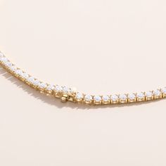 Katie Make a statement with our Lab Grown Bold Diamond Tennis Necklace. This stunning piece features a continuous line of lab-grown diamonds, each set to showcase their exceptional brilliance and fire. The bold design offers a modern twist on a classic tennis necklace, perfect for elevating any outfit. Whether worn for a special occasion or as a luxurious everyday accessory, this necklace combines sustainable luxury with timeless elegance. Add a touch of sophistication and bold sparkle to your j Daisy Pendant, Diamond Tennis Necklace, Continuous Line, Tennis Necklace, Handcrafted Necklace, Everyday Accessories, Bold Design, Lab Grown, Lab Grown Diamonds