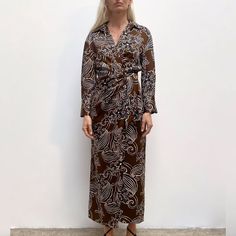 The Zara Wrap Dress In A Satin Floral Printed Maxi Style Is Perfect For Summer & Fall! This Shirtdress Ties From The Inside Right Side And Left Outer Side. The Dress Has A Sexy Front High Slit Guaranteed To Get Everyone's Attention! Wear With Strappy Sandals In Warm Weather And Knee/Thigh-High Boots In The Cooler Days! Nwt -Medium -Bust 18" -Length 51" -Lapel Collar -Long Sleeves -Jewel Button Cuffs Casual Business Vacation Travel Party Wrap Dress Summer Fall Autumn High Leg Slit Resort Wear Fem Wrap Dress Summer, Shirt Dress Long, Dress Shirt Dress, Dress Long Sleeves, Maxi Styles, Travel Party, Long Shirt Dress, Long Sleeve Shirt Dress, Vacation Travel