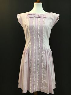 50's Lavender Betty Barclay Bow & Lace Dress | Etsy Lavender Cotton Dress With Ruffles, Lavender Cotton Dress For Garden Party, Fitted Feminine Pastel Dress, Feminine Fitted Pastel Dresses, Elegant Pink Dress For Tea Party, Vintage Lavender Dress For Daywear, Feminine Pastel Dresses With Ruffles, Feminine Lavender Dress For Daywear, Lavender Cotton Daywear Dress