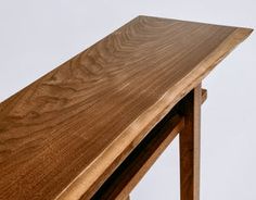 a close up of a wooden table with no one on it or in the background