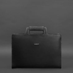 An original bag for a laptop and documents will emphasize the status and style of the owner.The bag is made of high-quality genuine leather. Strong textile lining inside. All seams are sewn by hand with strong threads.The bag has one large compartment and a pocket for a laptop with a strap to fix the device. There are also two internal pockets for small items.It is convenient to carry the accessory in the hand or on the shoulder. A long leather shoulder strap is included.Such a bag will be a gre Modern Satchel With Laptop Sleeve, Modern Satchel Tote With Laptop Sleeve, Modern Top Handle Shoulder Bag With Laptop Sleeve, Modern Top Handle Satchel With Laptop Sleeve, Modern Bag With Laptop Sleeve And Top Handle, Office Satchel With Laptop Sleeve And Top Handle, Luxury Rectangular Briefcase With Laptop Sleeve, Professional Leather Rectangular Satchel, Leather Shoulder Bag Briefcase For Business