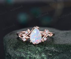 - Metal: Solid gold(10K/14K/18K white/yellow/rose gold),925 sterling silver,platinum available- Main Stone: 6x8mm pear lab opal- Accent Stone: natural amethysts- Band Width: 1.4mm- Can be personalized: Yes Pear Shape Opal Engagement Ring, Engagement Ring With Opal, Chicken Wedding, Opal Wedding Ring Set, White Opal Engagement Ring, Enchanting Jewelry, Opal Engagement Ring Rose Gold, Opal Wedding Ring, Amethyst Wedding Rings