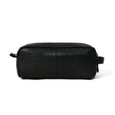 The Midnight Deluxe Toiletry Bag is an essential travel accessory for the modern man. Crafted from high-quality black leather, the sleek and compact design keep grooming essentials well-organized and secure during transportation. Specialized compartments and pockets allow for optimal storage of items, such as electric shavers, scissors, and more. The bag's leather exterior is not only stylish, but also strong and resilient, providing years of lasting use. Salient Features Color: Black Double sec Black Leather Pouch For On-the-go, Black Rectangular Pouch With Luggage Sleeve, Black Pouch With Luggage Sleeve For Everyday Use, Functional Leather Pouch With Zipper Closure, Black Travel Cases With Zipper Pocket, Black Soft Leather Pouch For Business, Versatile Black Leather Travel Accessories, Classic Black Travel Pouch, Black Soft Leather Business Pouch