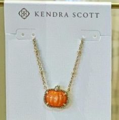 Fall Ready! Celebrate Pumpkin Season In Style With The Pumpkin Gold Short Pendant Necklace In Orange Mother-Of-Pearl. A Charming Take On The Classic Pendant Style, You’ll Wear This Seasonal Necklace For Every Fall Festivity, From Pumpkin Carving To Trick-Or-Treating. Metal14k Gold Over Brass Materialorange Mother Of Pearl Closure: Lobster Clasp W/ Single Adjustable Slider Bead Size19" Chain, 0.6"L X 0.55"W Pendant Short Pendant Necklace, Pumpkin Necklace, Gold Shorts, Pumpkin Season, Pumpkin Seasoning, Find Color, Fall Jewelry, Kendra Scott Jewelry, Fall Festival