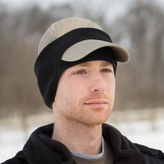 a man wearing a hat in the snow