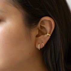 Classic Gold conch ear cuff that will hug your conch perfectly. Perfect to wear alone or paired with other huggie earrings. Sold as a single earring. Gold Vermeil Hypoallergenic, lead and nickel free Thickness 3mm Inner Diameter 0.35in(9mm) #J522-G Trendy Huggie Ear Cuff For Pierced Ears, Adjustable Huggie Ear Cuff With Ear Wire, Adjustable Huggie Wrap Earrings For Pierced Ears, Trendy Huggie Ear Cuff For Everyday Wear, Adjustable Hypoallergenic Huggie Wrap Earrings, Pierced Adjustable Huggie Ear Cuff, Adjustable Pierced Huggie Ear Cuff, Everyday Pierced Huggie Ear Climbers, Tarnish Resistant Huggie Ear Cuff