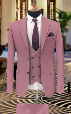 This is a Classy Dusty Pink 3 Piece Suit by fixashop /crafted from high quality fabric and imported materials. Our products are handcrafted by experienced tailors who make sure the that the stitching is precise, lining is proper and the overall product is sturdy enough to not go out of shape for more than a few years. Also all our products have extra margins in their length, sleeves, sides so it's easily alterable if your size changes after some time. To see more available colours and designs in this collection, Check out the ' Collection' Section. *This is a 3 piece set of a Coat+westcoast+pant  *We also offer customization so we can provide you an even better fit if you massage us your measurements (in inches) of Chest, Stomach, Waist, Hip, Shoulder and Actual Height after ordering. *Wan Fitted Pink Wedding Suits, Pink Fitted Suit For Parties, Pink Fitted Suits For Party, Pink Fitted Wedding Suit, Tailored Pink Suits For Party, Fitted Pink Suit And Tie Accessories For Formal Occasions, Pink Tailored Tuxedo, Elegant Pink Tuxedo For Semi-formal Occasions, Elegant Semi-formal Pink Suits