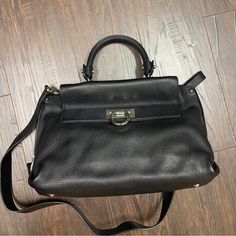 Beautiful Black Leather Bag. Never Used. Still Have Dust Cover And Original Price Tag. High-end Black Formal Satchel, Black Formal Satchel With Palladium Hardware, Designer Black Satchel For Formal Occasions, Black Designer Satchel For Formal Occasions, Timeless Black Calf Leather Bags, Black Luxury Satchel With Palladium Hardware, Luxury Black Satchel With Palladium Hardware, Designer Black Satchel With Leather Lining, Luxury Black Satchel With Leather Lining