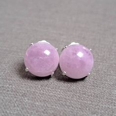 "This Listing Is For The Exact Studs Pictured These wonderful large, pale pink, natural luminous kunzite gemstone stud earring are handset in artisan made, solid sterling silver prong-set ear wires settings. These delicate, light beauties will give any outfit an extra classy look with a pearl-like shine to give it the extra pop of colors it needs! Earrings area approx. 10mm (0.40\"). **Kunzite is known as a stone of romantic love and emotion. It is said to connect the heart to the mind and increase the opportunity to find love/soulmate. It is said to release walls around the heart and increase openness for a relationship or to experience love.** -Handcrafted sterling silver prong earring settings  0.40\" (10 mm) -Genuine natural kunzite gemstones are approx. 0.40\" (10 mm) ( Please note th Kunzite Jewelry, Love Soulmate, Pink Kunzite, Gemstone Stud Earrings, Jewelry Card, Gemstone Studs, Sterling Silver Studs, How To Look Classy, Stud Earring