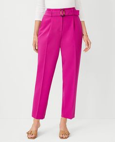 Elevate your wardrobe with the sophisticated charm of Ann Taylor's Petite Belted Taper Pant in Curvy Fit. Designed to flatter, these pants feature a high-rise waist with a self-tie buckle belt, ensuring a perfect fit for the modern woman.

- Size: Petite 00
- Color: Magenta Shadow
- Material: 79% Polyester, 17% Rayon, 4% Spandex
- Gender: Female
- Fit: Tailored and fitted
- Rise: High rise, sits 1/2" to 1" below natural waist
- Length: Hits at ankle, 25" inseam with a 15 1/4" leg opening
- Leg S Spring Tapered Pants With Belt Loops, Office Pants With Paperbag Waist And Belt Loops, Workwear Paperbag Waist Pants With Belted Cuffs, Workwear Bottoms With Belt And Tapered Leg, Tapered Leg Workwear Bottoms With Belt, Paperbag Waist Pants With Belted Cuffs For Work, Office Belted Tapered Leg Bottoms, Tapered Leg Pants With Belt Detail For Work, Paperbag Waist Bottoms With Belt Detail For Work