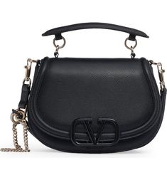 Valentino Garavani VSling Leather Saddle Bag | Nordstrom Evening Crossbody Saddle Bag With Detachable Handle, Evening Saddle Bag With Detachable Strap And Double Handle, Luxury Saddle Satchel Bag For Evening, Evening Saddle Shoulder Bag With Silver-tone Hardware, Evening Flap Shoulder Bag With Logo Hardware, Evening Bags With Logo Hardware And Double Handle, Modern Evening Satchel With Logo Hardware, Evening Saddle Shoulder Bag With Branded Hardware, Evening Saddle Bag With Top Handle And Metal Hardware