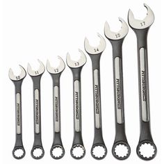 six wrenches are lined up in a row