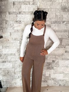 Women's Solid Rib Overall Jumpsuit Time After Time Jumpsuit Introducing our Solid Rib Overall Jumpsuit, a stylish and comfortable piece that effortlessly combines practicality and modern design. Item Details: Solid Rib Fabric: Offers a soft and textured feel for ultimate comfort. Button-In Straps: Allows for an adjustable and secure fit. Side Patch Pockets: Adds a functional and trendy touch for carrying essentials. Wide Leg Design: Ensures a relaxed and flowy silhouette. Overall Style: Classic Casual Brown Bodysuit, Casual Brown Jumpsuits And Rompers Overall, Casual Brown Overall Jumpsuits And Rompers, Casual Brown Bodysuit For Loungewear, Trendy Brown Jumpsuits And Rompers For Loungewear, Fitted Brown Overall Jumpsuit, Fitted Brown Jumpsuit, Casual Fitted Brown Overalls, Casual Fall Bodysuit