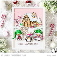 a christmas card with an image of two gnomes and a house