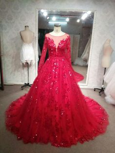 Many brides have asked for long sleeve red wedding gowns. Red is a less traditional bridal color that is a bit more festive. Wedding Dress Lace Long Sleeve, Red Bridal Gown, Red Wedding Gowns, Red Formal Dresses, Wedding Evening Gown, Long Bridal Gown, Red Ball Gown, Custom Wedding Gown, Red Wedding Dress