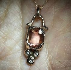 Please go to my Instagram watch the video about this pendant ~ Chic and gorgeous organic bezel set with one piece of Oregon Sunstone full of schilling and three pieces of sparkle diamonds on the bottom. A fun and adorable piece. All handcrafted by me in my Michigan studio. Gem: genuine Oregon Sunstone / fair trade / 1.40ct / imperfection with inclusions genuine diamond / F color / VS grade / three pieces Metal: recycled 14k rose gold / approx. 27mm long, 10mm wide (all components) / chain: 16 in Custom Rose Gold 14k Gold Pendant Necklace, Custom Rose Gold 14k Pendant Necklace, Formal Rose Gold Jewelry With Large Pendant, Unique Rose Gold Pendant Necklace, 14k Rose Gold Rectangular Pendant, Unique Rose Gold Round Pendant Jewelry, 14k Rose Gold Pendant Jewelry, Unique Rose Gold Pendant Jewelry, Unique Rose Gold Round Pendant Necklace