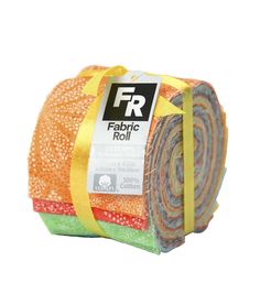 the fabric roll is multicolored and has a yellow ribbon on top of it