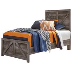 a bed with an orange and blue blanket on it's headboard is shown