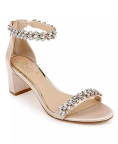 a women's sandal with jewel embellishments on the ankle and heel