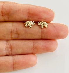 14K Solid Gold Elephant Earrings 14K Solid Gold Butterfly Closure      Size: 6mm x 8.5mm 14k Real Gold  SOLD AS A PAIR Nickel and lead free   Hypoallergenic Elephant Earrings Studs, Gold Elephant, Elephant Earrings, Dainty Studs, Sell Gold, Gold Butterfly, Gold Earring, Fine Jewellery Earrings, Jewelry Earrings Studs