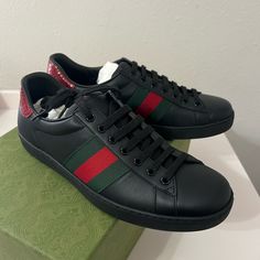 Brand New Men Gucci Sneaker Gucci Size 7=8us Authentic, Brand New Condition Gucci Black Sneakers With Contrast Sole, Luxury Black Slip-on Sneakers, Gucci Lace-up Sneakers With Leather Sole, Gucci Leather Sneakers With Leather Sole, Black Luxury Slip-on Sneakers, Gucci Low-top Sneakers With Leather Sole, Gucci Leather Slip-on Sneakers, Classic Gucci Sneakers, Gucci Leather Sneakers With Red Sole