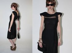 "Elegant Black Silk Shantung 1960s Cocktail Dress featuring Black illusion bust, with Sailor Neckline Detail and low back. Circa Early 1960s. Metal Zip Closure. Fitted and Chic, Perfect for weddings! by 'LORA LENOX, Sculptured Charm' Excellent Condition- A Hand stitched Repair was made on back skirt, but unnoticeable and blends with Shantung Texture Bust- 34\" Waist- 34\" Hip- 38\" Length- 40\" Hem- 44\"" Vintage Black Cocktail Dress, 1960s Cocktail Dress, Back Skirt, Breakfast At Tiffany's, 60s Dress, Black Cocktail, Black Cocktail Dress, Black Silk, Dress Clothes For Women