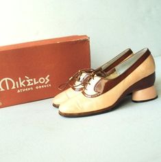 "Wearable art vintage 70s, cream- brown patent leather oxford style , sculptured , rounded heel, high fashion, hand made shoes by Mikelos, Athens collection. With the original box. Showstopping. Gently used condition. Clean and strong inside and out. No discoloration ,no odor. The shoes ( please see the photo) have a stiff leather on the back , look like a crinkle.But it's not noticeable. The glossy brown leather and leather shoelace in the excellent condition. Size 7AA. Length of the insole:9,5 Retro Brown Leather Oxfords, Retro Formal Oxfords, Retro Brogue Detailing Closed Toe Oxfords, Retro Brogue Oxfords With Closed Toe, Retro Brown Almond Toe Oxfords, Retro Oxfords With Brogue Detailing, Retro Brown Oxfords, Retro Leather Oxfords With Pointed Toe, Vintage Leather Oxfords With Almond Toe