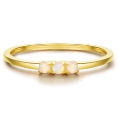 PRICES MAY VARY. This minimalist style white opal ring is perfect for every day wear and stacking. As the opals catch the light, they radiantly shine a rainbow of colors. Metal - The ring is made with solid sterling silver, 18k yellow gold plated for a lasting finish. Measurement- 1.5mm opal stones, 1.2mm skinny band. Gift - Packed in our brand jewelry pouch, ready to give to a loved one. It makes the most Perfect gift as an anniversary gift, or replacement for your diamond ring for an getaway. October Birthstone Ring, Slim Ring, Expensive Rings, Beautiful Baubles, October Birthstone Rings, White Opal Ring, Opal Studs, Ring Minimalist, October Birthstone