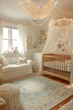 a baby's room decorated in white with lights