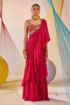 Rani pink pre-draped ruffle saree in chinon chiffon base. Comes with a raw silk padded blouse with resham and zardosi hand embroidery. - Aza Fashions Traditional Pre-draped Saree With Ruffles For Summer, Ruffled Georgette Blouse Piece For Festivals, Pre-draped Saree With Ruffles For Festivals, Traditional Summer Pre-draped Saree With Ruffles, Draped Blouse With Ruffles, Summer Festive Pre-draped Saree With Ruffles, Festive Georgette Blouse With Ruffles, Ruffled Saree For Festivals With Traditional Drape, Traditional Drape Saree With Ruffles For Festivals