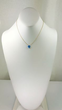 Description Simple. Chic. Minimalist™ A perfectly dainty brilliant synthetic fiery blue opal cross is floating freely on a delicate feminine 14k gold plated over Sterling silver chain. This cute and tiny star charm necklace features a synthetic created blue opal moon stone with sterling silver chain. This lovely star necklace is perfect for complementing a casual outfit, and you can even layerbit with other necklace to create something unique. * High Quality 925 Sterling Silver link chain with s Minimalist Hypoallergenic Blue Necklace, Dainty Blue Jewelry With Adjustable Chain, Dainty Blue Round Pendant Jewelry, Blue Dainty Round Pendant Jewelry, Dainty Blue Round Pendant Charm Necklace, Fine Jewelry With Blue Delicate Chain, Blue Opal Dainty Necklace, Blue Fine Jewelry With Delicate Chain, Blue Delicate Chain Fine Jewelry