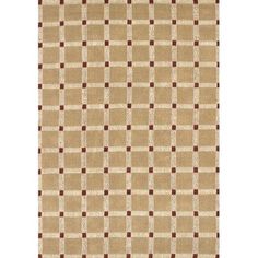 a beige rug with black squares on it