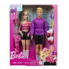 two barbie dolls are shown in the box