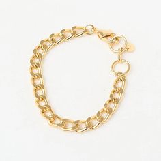 The Fine Grumet Chain Bracelet is a classic and elegant piece that adds a refined touch to your look. Crafted with a fine grumet link chain, this bracelet is gold plated to provide a luxurious shine. The minimalist design of the fine chain makes this bracelet versatile, perfect for daily wear or to complement more formal outfits. Its 16 cm size ensures a comfortable fit on the wrist, making it a timeless and sophisticated choice. The gold plating adds warmth and elegance to the Fine Grumet Chain Bracelet, enhancing the beauty of the grumet links. It’s ideal for those seeking a classic and understated piece of jewelry that adapts effortlessly to various styles and occasions. Wear the Fine Grumet Chain Bracelet alone for a delicate look or layer it with other bracelets to create a more elabo Formal Outfits, The Minimalist, Formal Outfit, Bracelet Gold, Earring Necklace, Link Chain, Ring Necklace, Gold Plating, Link Bracelets