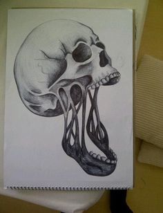 a drawing of a human skull with its mouth open