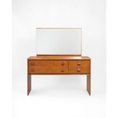 a wooden dresser with a mirror on top of it and drawers under the drawer, against a white background