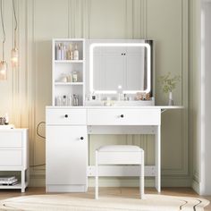 a white dressing table with a mirror and stool in front of it on top of a rug